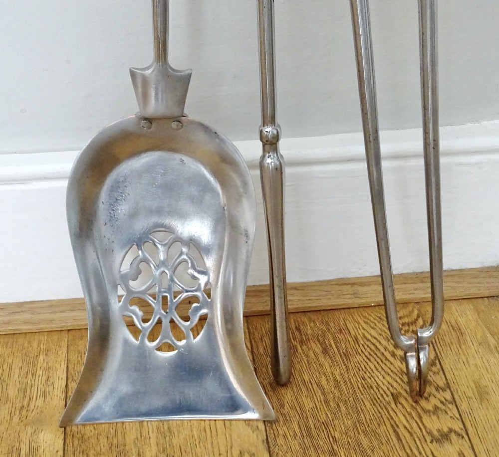 SET OF POLISHED STEEL FIRE IRONS View IV