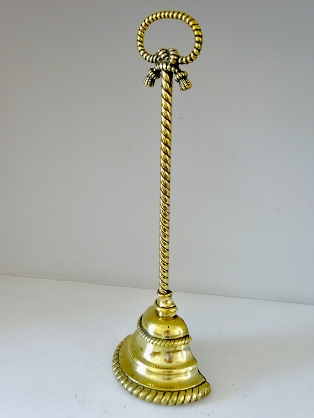 BRASS DOORSTOP WITH ORIGINAL IRON WEIGHTED BASE View V