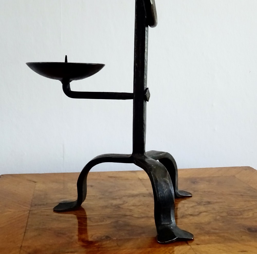 AN IRON CANDLE HOLDER View III