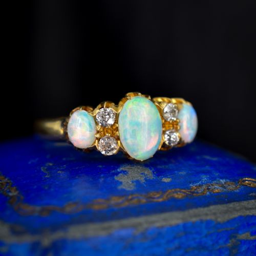 ANTIQUE NATURAL OPAL AND DIAMOND 18CT YELLOW GOLD THREE STONE RING