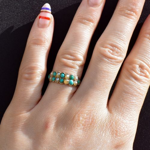 fig 1. An antique Victorian 12ct gold double row ring set with alternating turquoise cabochons and natural pearls.