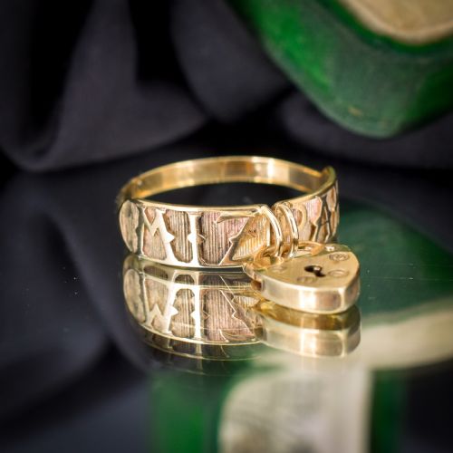 fig 2. A vintage 9ct yellow gold band ring featuring relief MIZPAH lettering and a dangling heart padlock charm.
