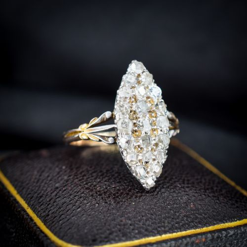 fig 1. A Victorian 18ct gold navette ring featuring a cluster of multiple old-cut diamonds set in silver-topped shoulders and head.