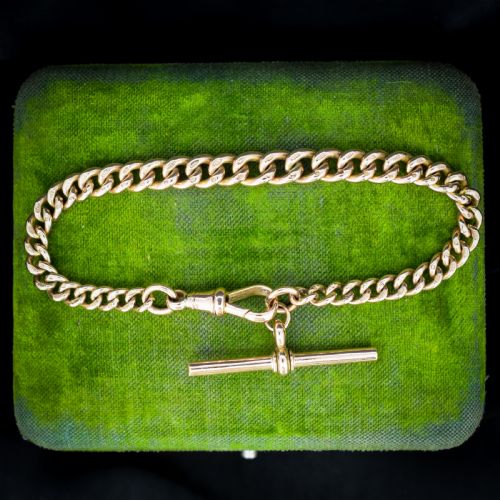 ANTIQUE GRADUATED CURB 9CT GOLD BRACELET WITH DOG CLIP AND TBAR DROP 825
