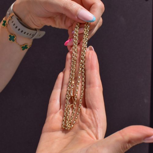 fig 2. A Victorian 9ct gold chain necklace featuring faceted links and a swivel dog clip fastener.
