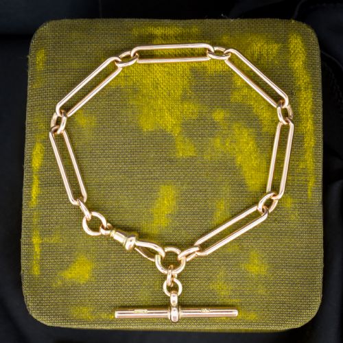 ANTIQUE CHESTER '1895' 9CT GOLD TROMBONE LINK BRACELET WITH DOG CLIP AND TBAR 775