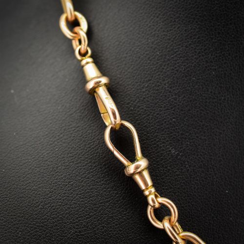 fig 3. A 9ct yellow gold Albert chain necklace featuring alternating trombone links and a central T-bar pendant drop.