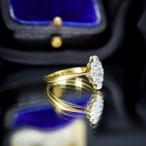 fig 2. An antique diamond navette cluster ring set in platinum with an 18ct yellow gold band.