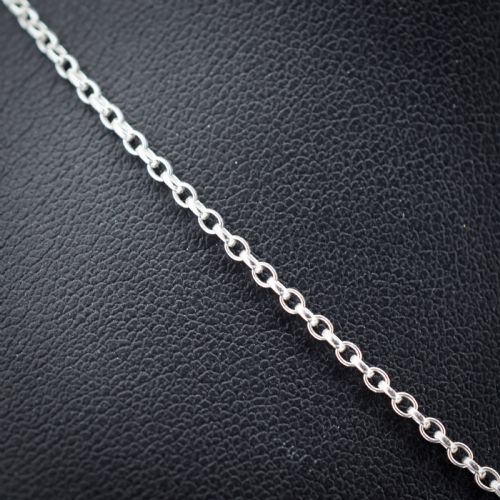 fig 3. An antique silver necklace featuring a heart-shaped purple paste central stone surrounded by clear paste stones and topped with a bow motif.