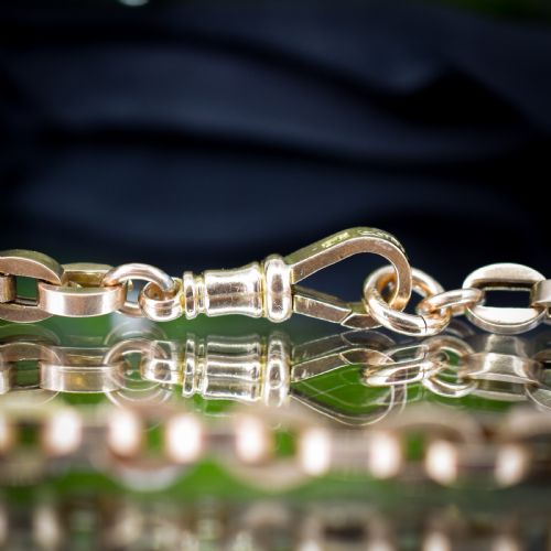 fig 1. An antique 9ct yellow gold bracelet featuring uniform oval cable links secured with a swivel dog clip fastener.