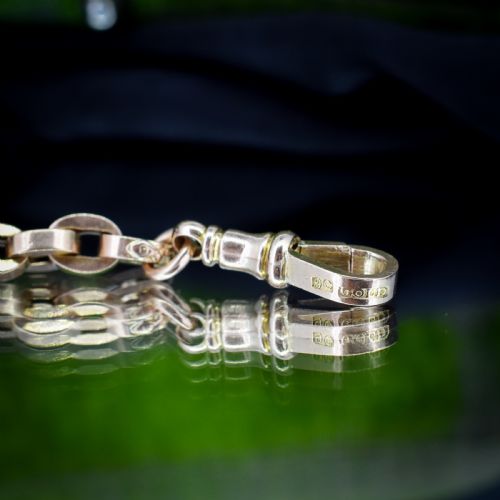 fig 2. An antique 9ct yellow gold bracelet featuring uniform oval cable links secured with a swivel dog clip fastener.