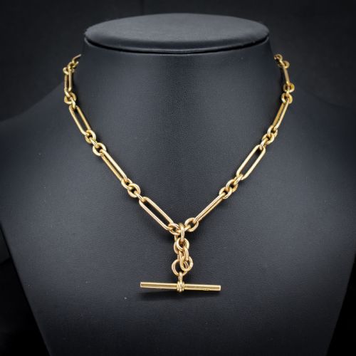 fig 2. A 9ct yellow gold Art Deco Albert watch chain featuring alternating elongated trombone links, a swivel clasp, and a T-bar.