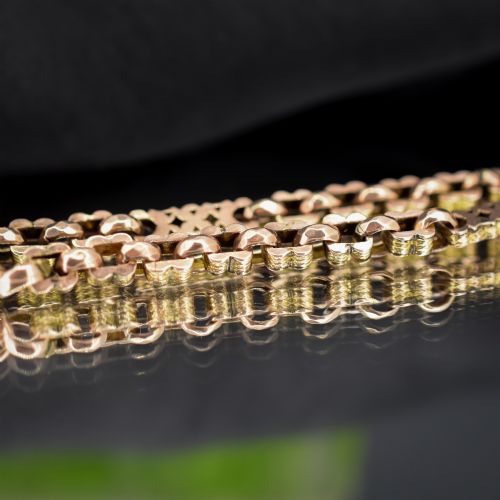 fig 2. An antique 9ct yellow gold fancy link chain bracelet with a swivel clasp and suspended T-bar element.