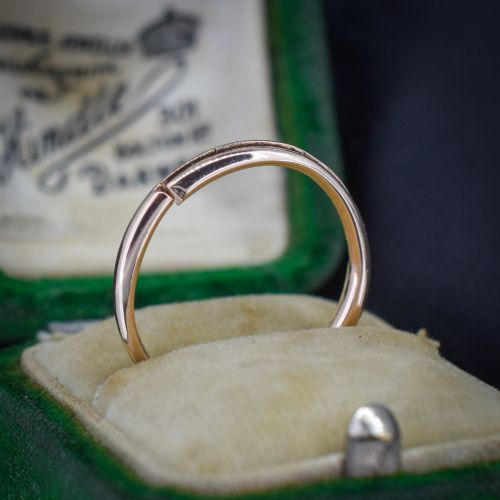 fig 2. A circular 9ct gold split ring measuring 20 millimetres with a double-coiled wire design.
