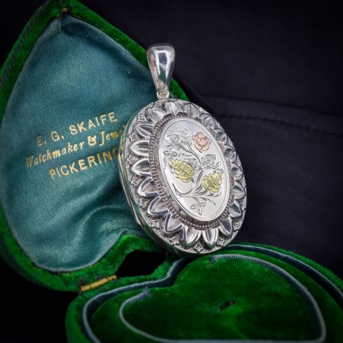 fig 1. Antique Victorian Silver and Gold Oval Floral Photo Locket Pendant