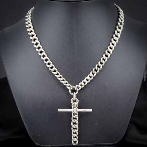 fig 1. An antique sterling silver curb link Albert chain featuring a central T-bar attachment and double dog clip clasps.