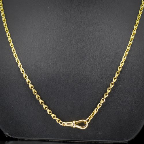 fig 2. An antique yellow gold twenty-inch chain necklace featuring love knot links and a functional swivel dog clip fastener.