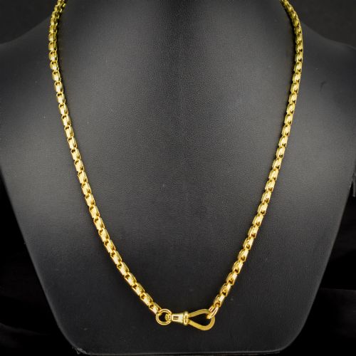 fig 1. An antique 9ct yellow gold tulip link fancy chain necklace featuring a traditional dog clip fastener.