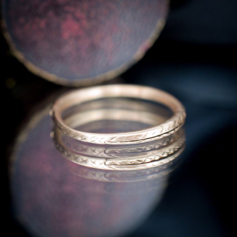A Georgian 9ct gold split ring with hand-engraved serpent Ouroboros details. View VIII