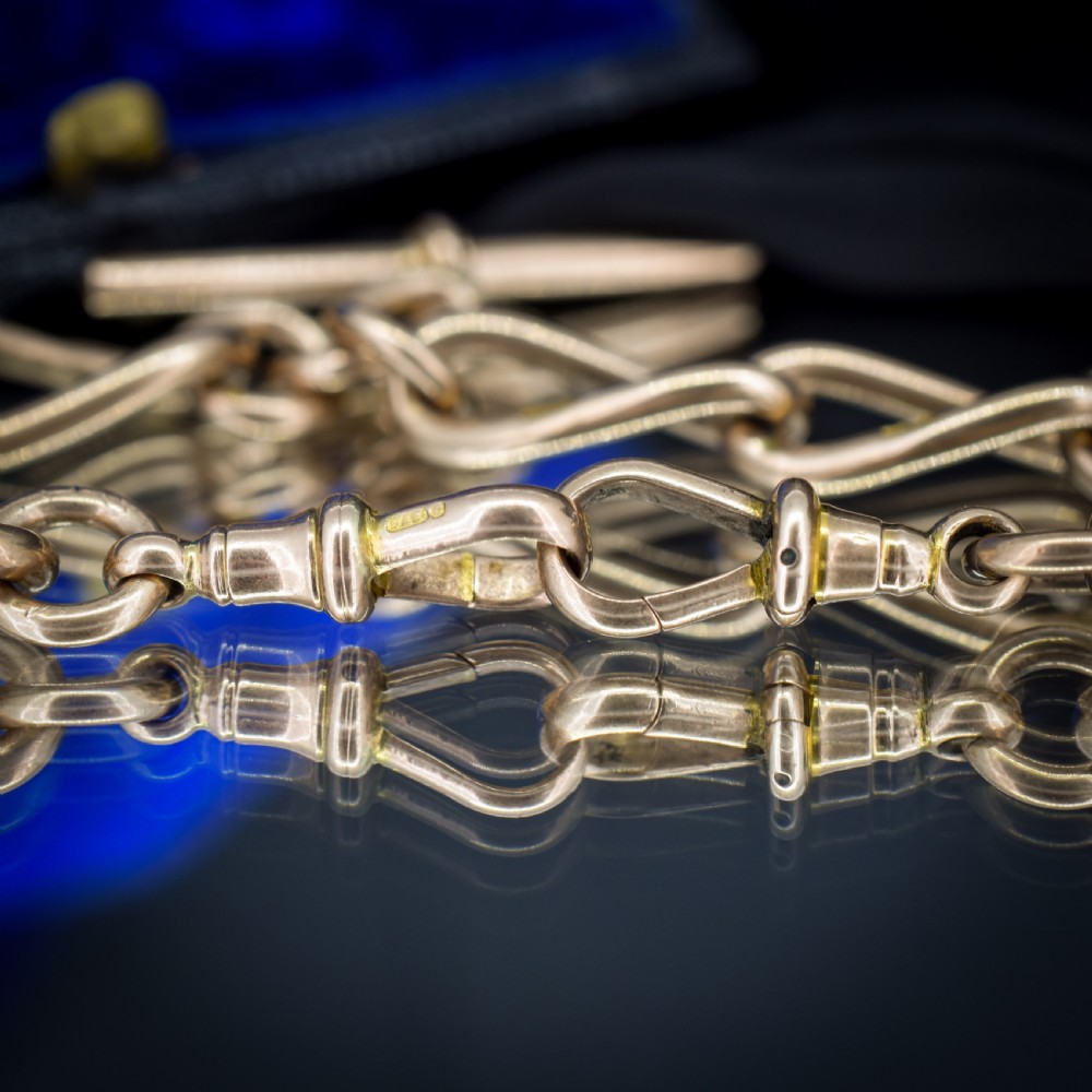 An antique 9ct yellow gold Albert watch chain necklace featuring polished oval links and a central suspended T-bar pendant. View VIII