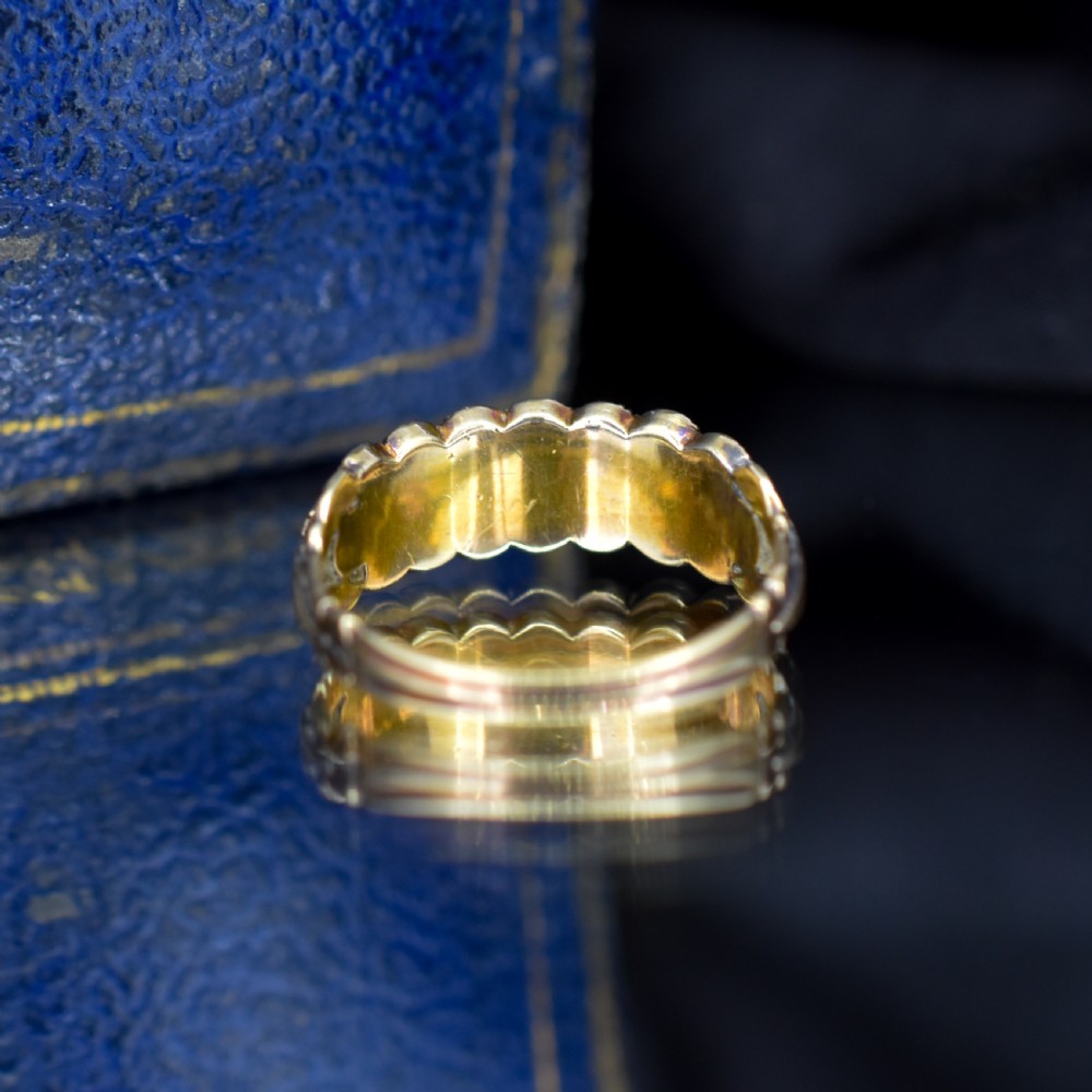 An antique Victorian 12ct gold double row ring set with alternating turquoise cabochons and natural pearls. View VIII