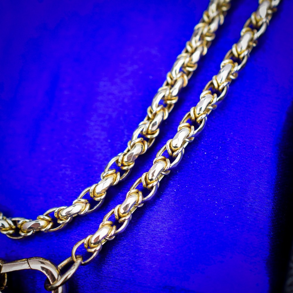 An antique 9ct yellow gold fancy link chain necklace featuring an elongated dog clip fastener. View II