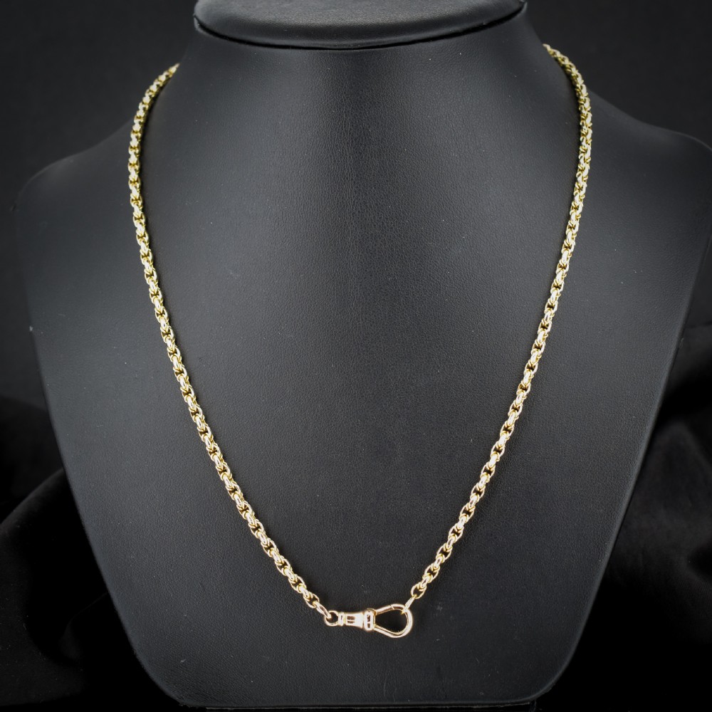 An antique 9ct yellow gold fancy link chain necklace featuring an elongated dog clip fastener. View III