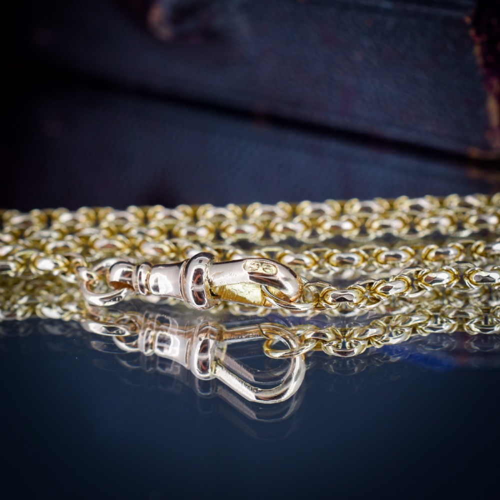 An antique 9ct yellow gold fancy link chain necklace featuring an elongated dog clip fastener. View VII