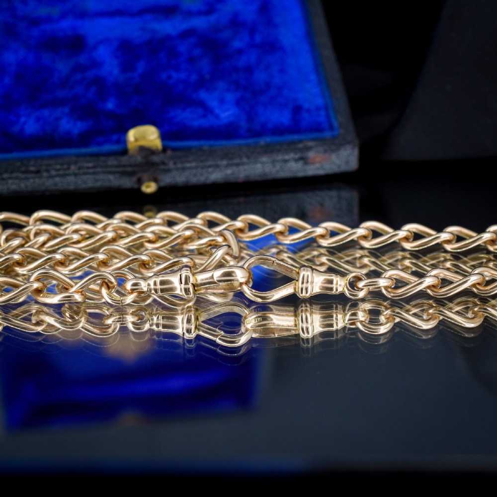 An antique 15ct yellow gold oval link Albert watch chain necklace featuring a suspended T-bar element. View VII