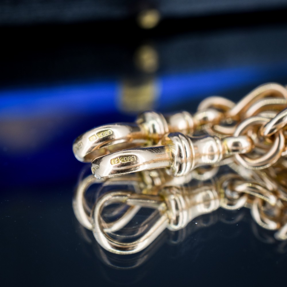 An antique 15ct yellow gold oval link Albert watch chain necklace featuring a suspended T-bar element. View VIII