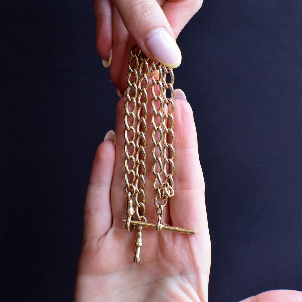 An antique 15ct yellow gold oval link Albert watch chain necklace featuring a suspended T-bar element. View XIII