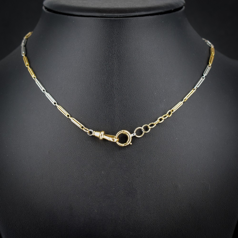 An antique two-tone chain necklace featuring alternating 18ct yellow gold and platinum elongated links with a dog clip and bolt ring clasp. View II