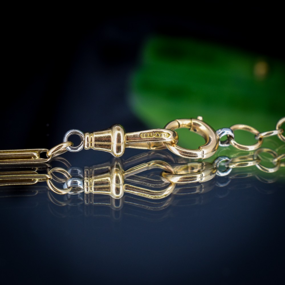 An antique two-tone chain necklace featuring alternating 18ct yellow gold and platinum elongated links with a dog clip and bolt ring clasp. View VIII