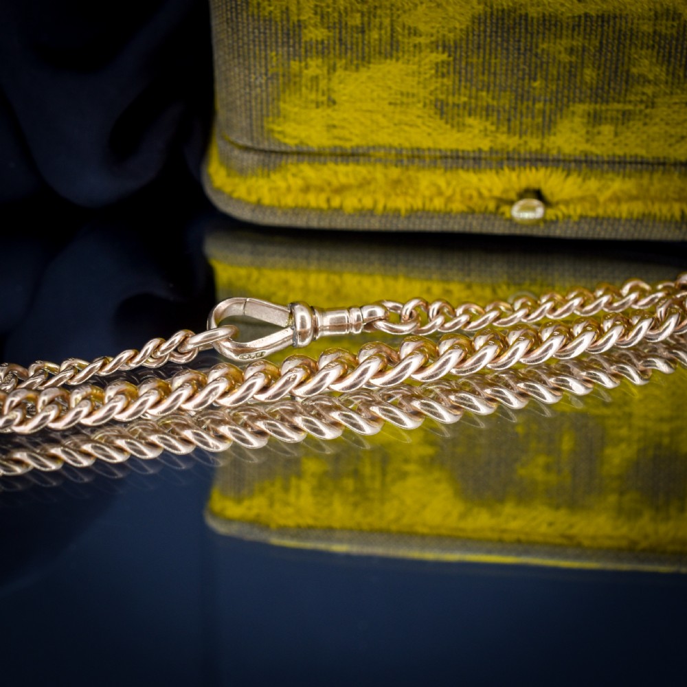 An antique 9ct yellow gold curb link chain bracelet with a swivel dog clip clasp. View VII