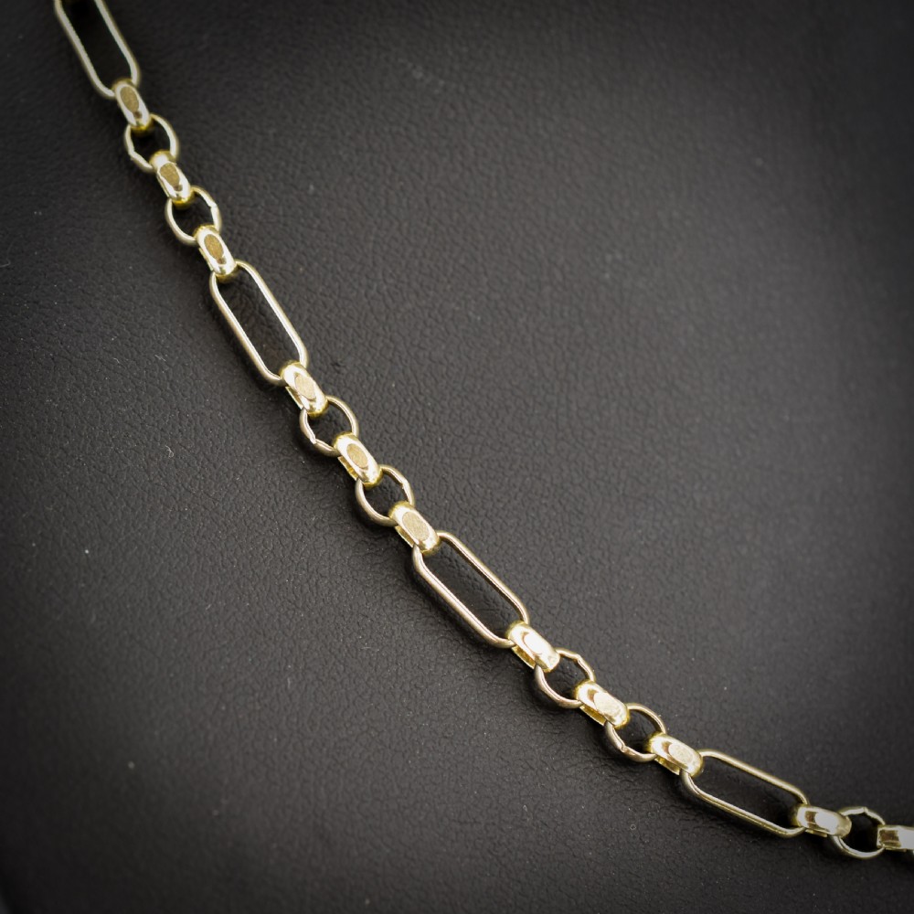 A vintage 9ct yellow gold fancy link chain necklace displayed inside a blue velvet fitted box. View III