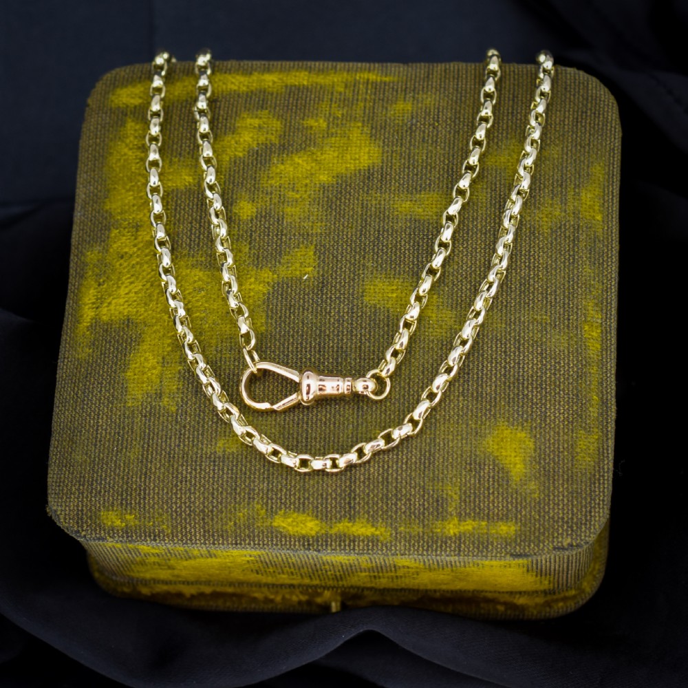 A Victorian 9ct gold chain necklace featuring faceted links and a swivel dog clip fastener.
