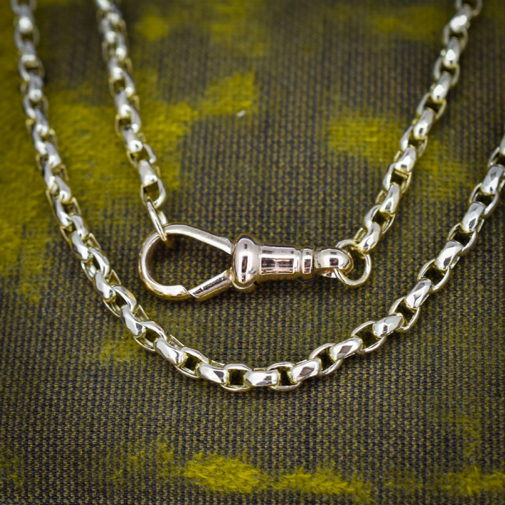A Victorian 9ct gold chain necklace featuring faceted links and a swivel dog clip fastener. View VII