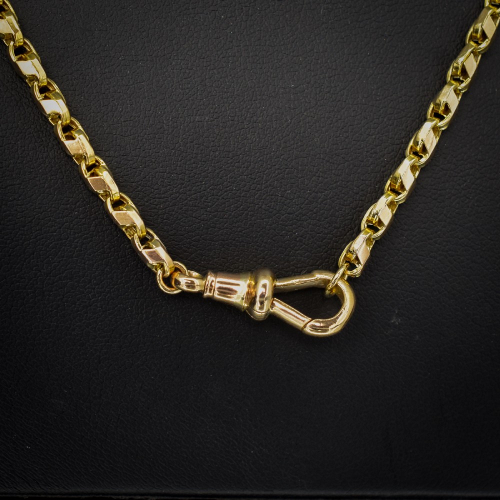 An antique 9ct yellow gold tulip link fancy chain necklace featuring a swivel dog clip clasp. View III