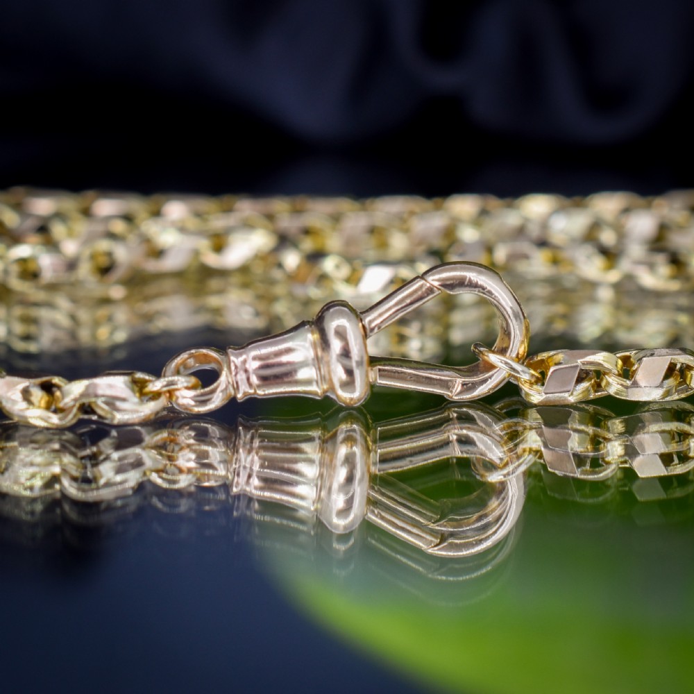 An antique 9ct yellow gold tulip link fancy chain necklace featuring a swivel dog clip clasp. View VIII