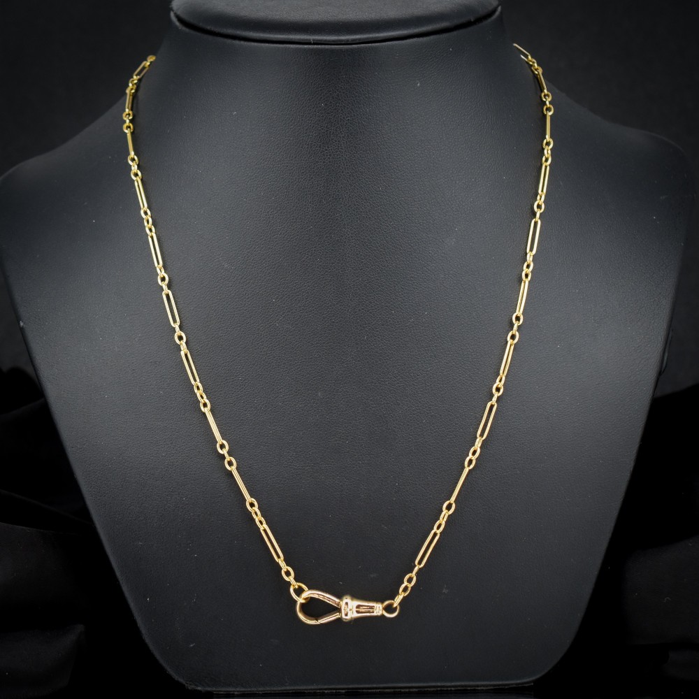 An antique 9ct yellow gold paperlink chain featuring elongated rectangular links and a dog clip swivel clasp. View II