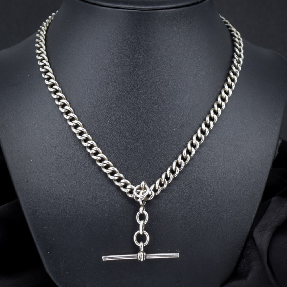An antique sterling silver Albert watch chain featuring heavy curb links, a central T-bar drop, and two swivel dog clip clasps. View II