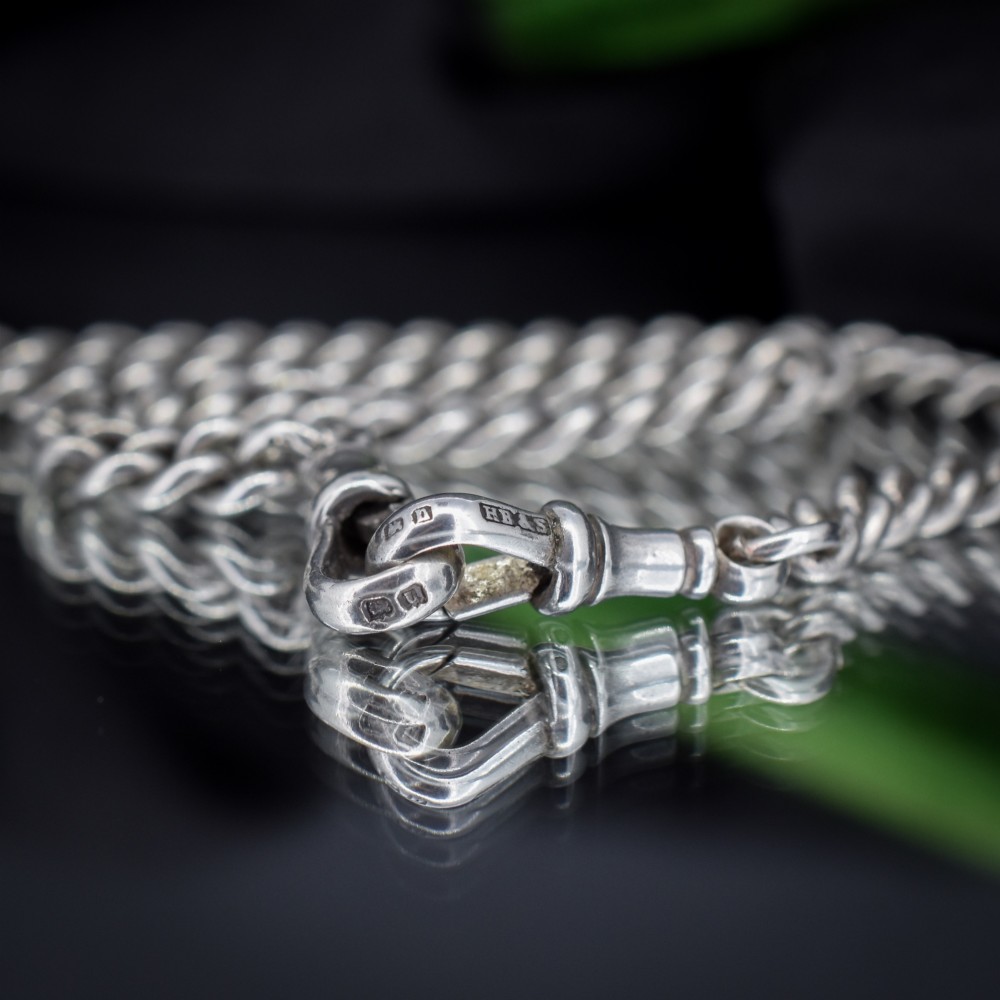An antique sterling silver uniform curb link Albert watch chain configured as a necklace with a suspended central T-bar. View VII