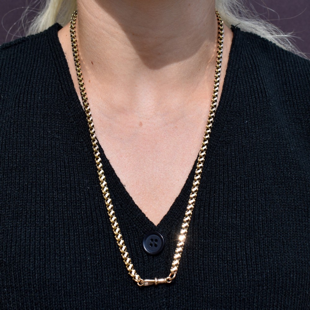 A Victorian 15ct yellow gold fancy link chain necklace fitted with a dog clip fastener. View X