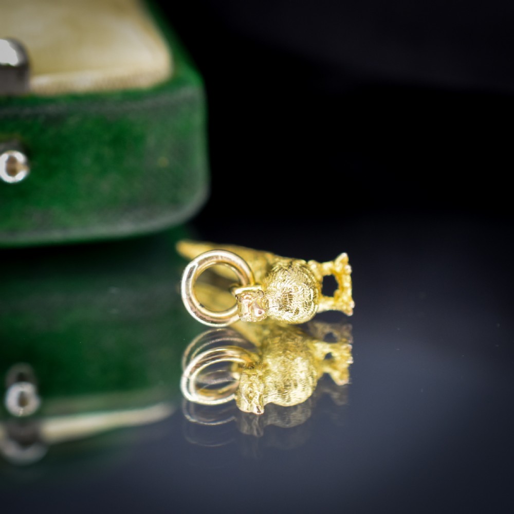 A detailed three-dimensional 9ct yellow gold pheasant bird charm with textured feathers and an attached jump ring. View IV