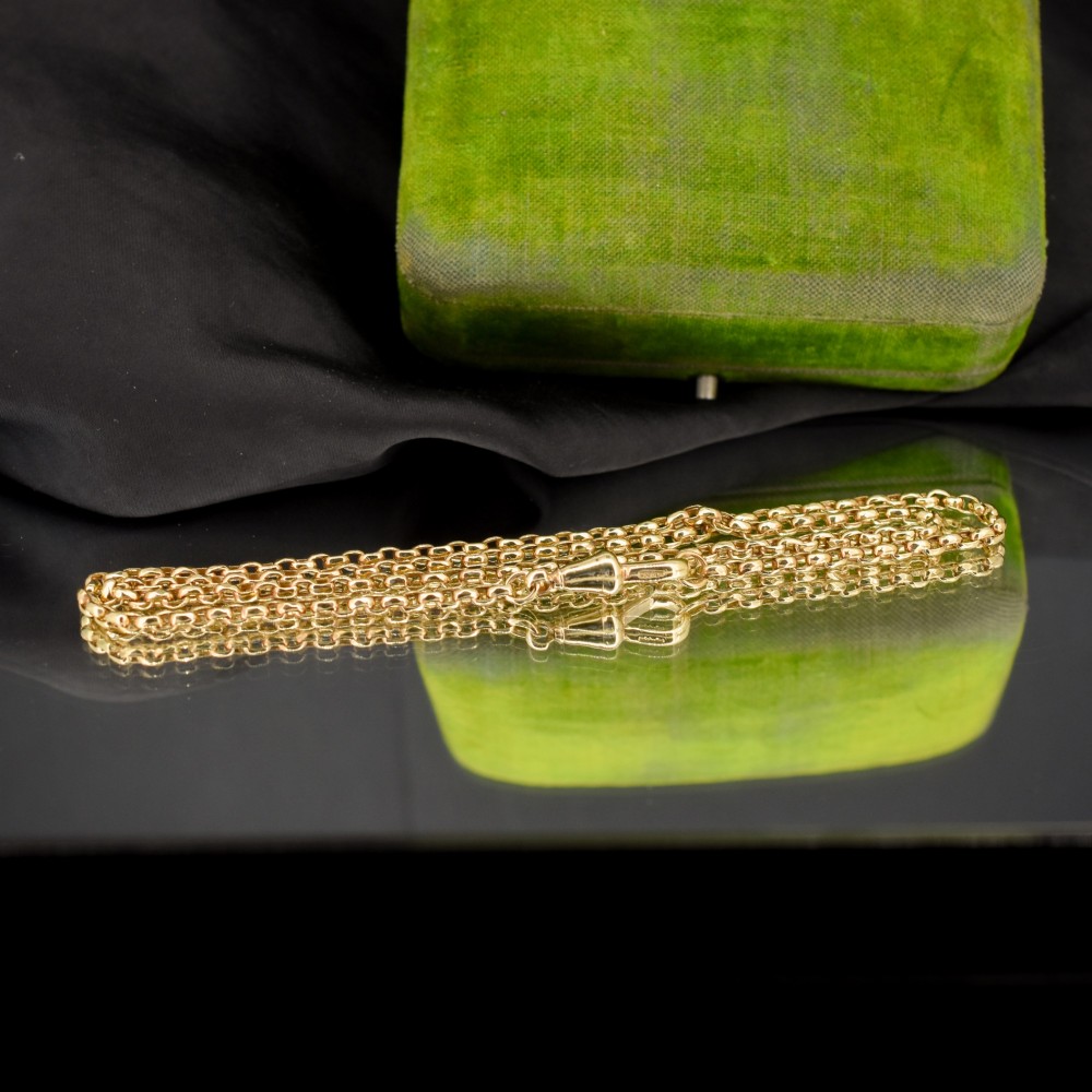 An antique Victorian 9ct yellow gold chain necklace with faceted circular links and a dog clip clasp. View III