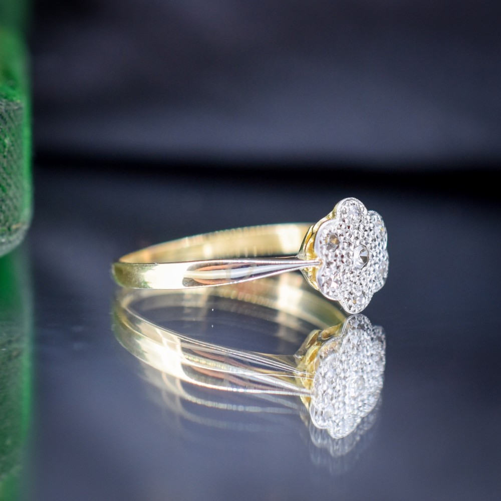 An antique 18ct yellow gold ring featuring a floral diamond cluster head set in platinum. View III