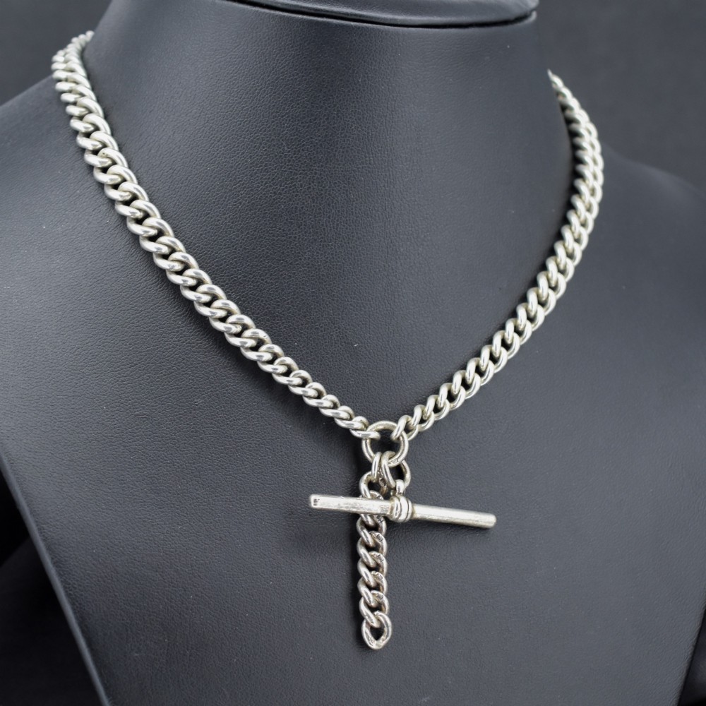 A sterling silver curb link double Albert pocket watch chain featuring a central T-bar. View VI