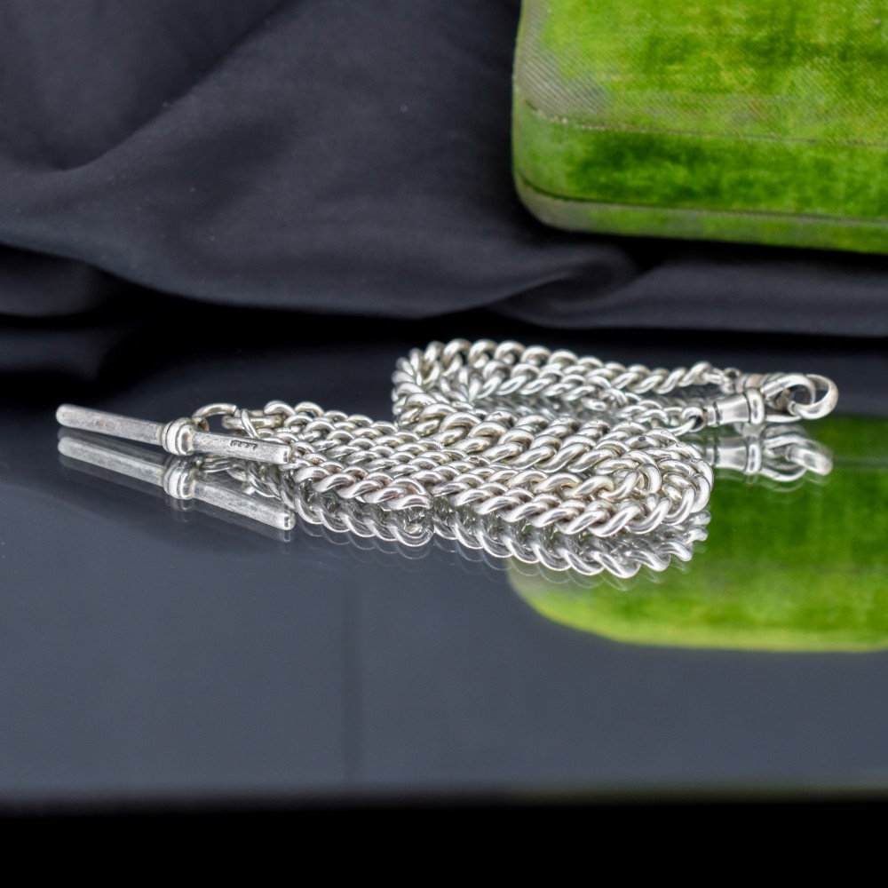 A sterling silver curb link double Albert pocket watch chain featuring a central T-bar. View XI