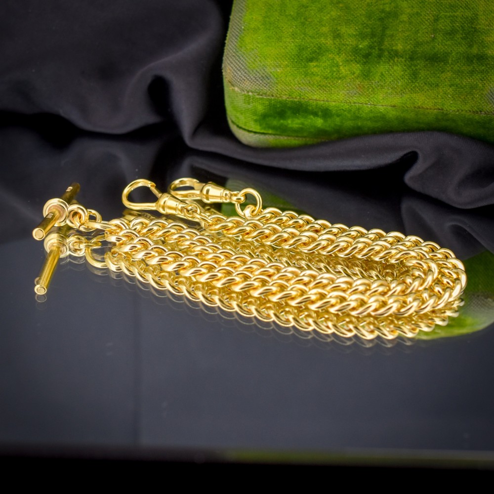 An antique gold-gilded sterling silver Albert watch chain featuring uniform curb links, a T-bar attachment, and dual swivel clasps. View VI
