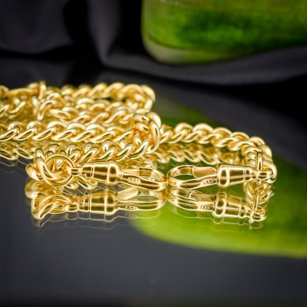 An antique gold-gilded sterling silver Albert watch chain featuring uniform curb links, a T-bar attachment, and dual swivel clasps. View VII